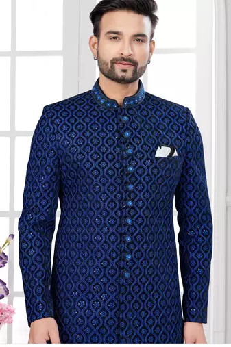 Blue black velvet embroidered  indo-western sherwani set with thread, stone & fancy button work.