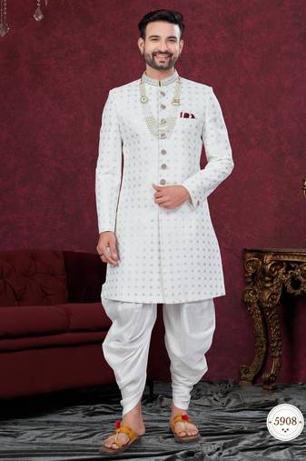 Off white embroidered jacket attached indo-western sherwani set with thread, stone & fancy button work.