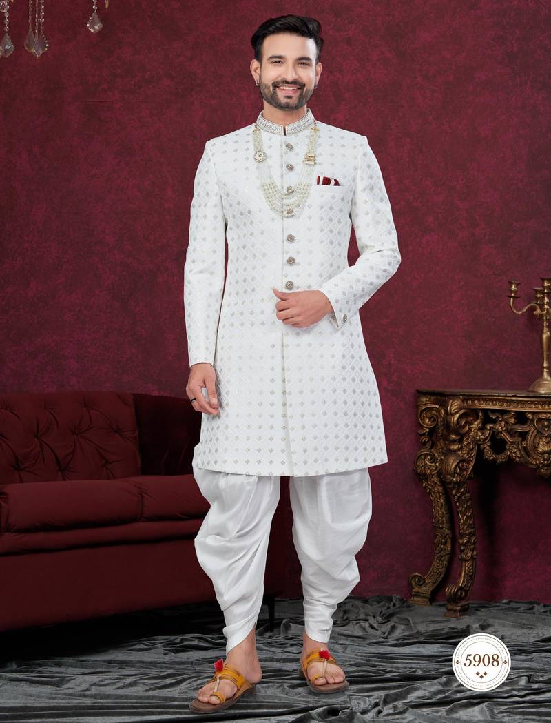 Off white embroidered jacket attached indo-western sherwani set with thread, stone & fancy button work.