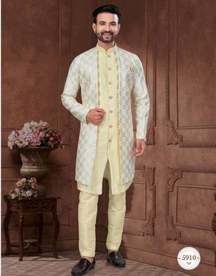 Light yellow embroidered jacket attached indo-western sherwani set with thread, stone & fancy button work. 1