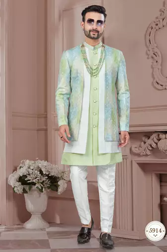 Pist green embroidered jacket attached indo-western sherwani set with thread, stone & fancy button work.