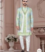 Pist green embroidered jacket attached indo-western sherwani set with thread, stone & fancy button work.