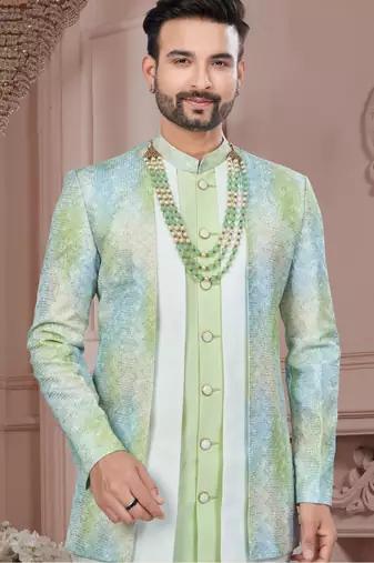 Pist green embroidered jacket attached indo-western sherwani set with thread, stone & fancy button work.