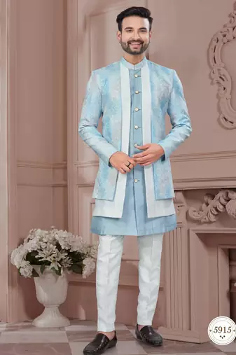 Blue embroidered jacket attached indo-western sherwani set with thread, stone & fancy button work.