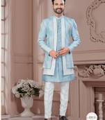 Blue embroidered jacket attached indo-western sherwani set with thread, stone & fancy button work.