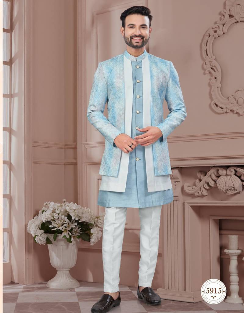 Blue embroidered jacket attached indo-western sherwani set with thread, stone & fancy button work.