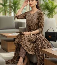 Women Ethnic Motifs Printed Regular Thread Work Kurta with Trousers