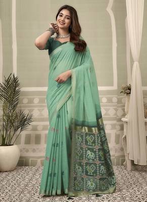 Turquoise cotton woven zari border patola pallu with fancy tassels casual wear saree 1