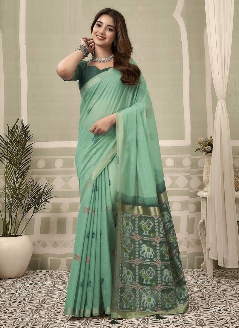 Turquoise cotton woven zari border patola pallu with fancy tassels casual wear saree