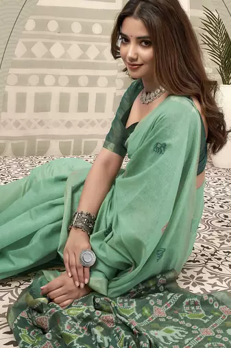 Turquoise cotton woven zari border patola pallu with fancy tassels casual wear saree