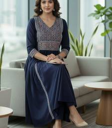 Women Ethnic Motifs Embroidered Pleated Kurta with Trousers