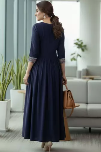 Women Ethnic Motifs Embroidered Pleated Kurta with Trousers