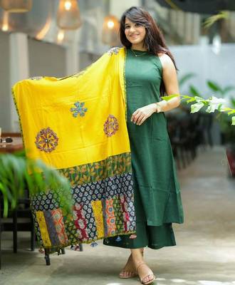 Beautiful bottle green solid handloom cotton neck a-line kurta palazzo set with yellow ajrakh applique mulmul dupatta 1