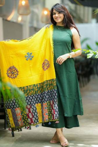 Beautiful bottle green solid handloom cotton neck a-line kurta palazzo set with yellow ajrakh applique mulmul dupatta