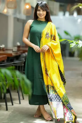 Beautiful bottle green solid handloom cotton neck a-line kurta palazzo set with yellow ajrakh applique mulmul dupatta