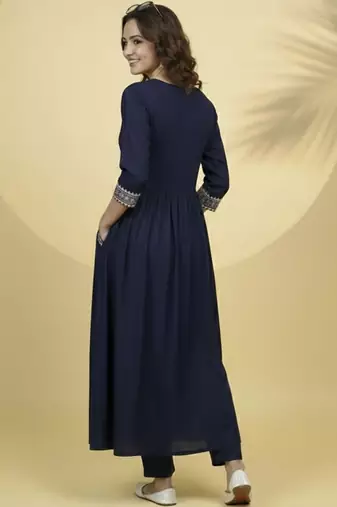 Women Ethnic Motifs Embroidered Empire Thread Work Kurta with Trousers