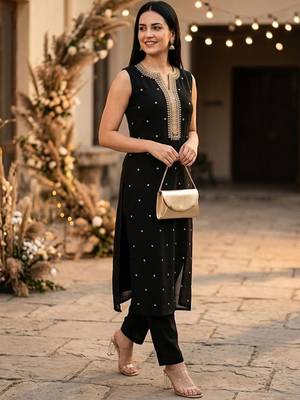 Women Embroidered Regular Kurta with Trousers 1