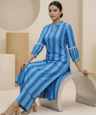 Women Printed Regular Kurta with Trousers 1
