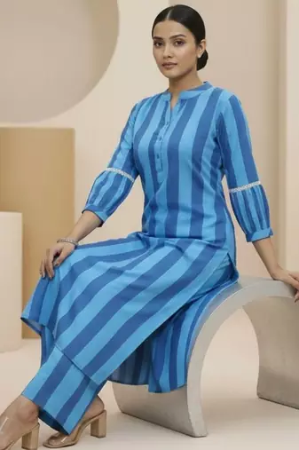 Women Printed Regular Kurta with Trousers