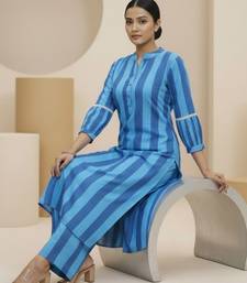 Women Printed Regular Kurta with Trousers
