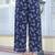 Navy Blue Floral Printed Empire Silk Georgette A-Line Kurta With Trouser