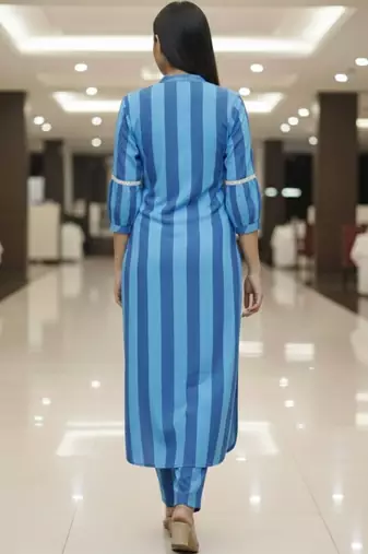 Women Printed Regular Kurta with Trousers