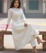 Women Striped Panelled Kurta with Trousers