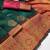 Sea green art silk blend banarasi jacquard motif work saree with unstitched blouse piece