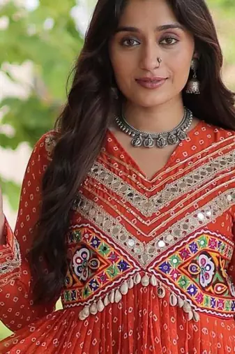 Rust faux georgette bandhni print with kutchi patche work ruffle navratri gown
