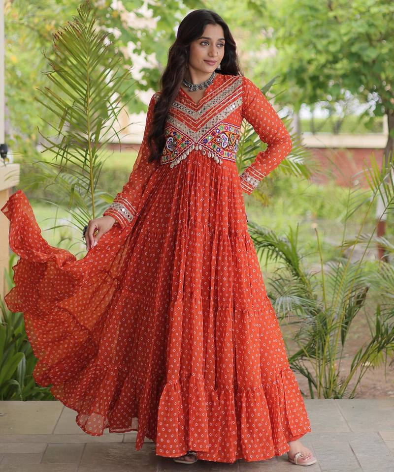 Rust faux georgette bandhni print with kutchi patche work ruffle navratri gown
