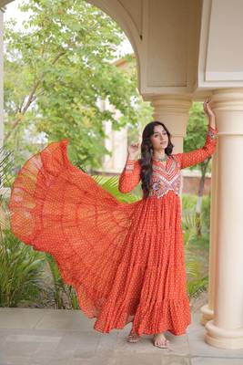 Rust faux georgette bandhni print with kutchi patche work ruffle navratri gown 4