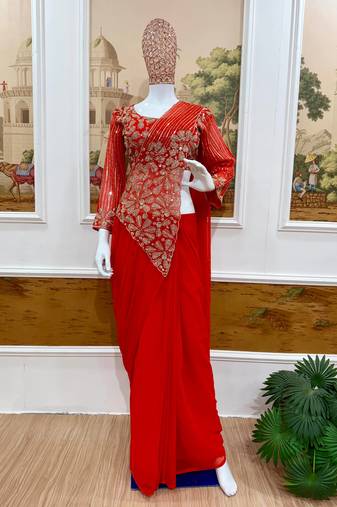 Red embroidered pre-draped saree with designer blouse