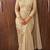 Cream embroidered pre-draped saree with designer blouse