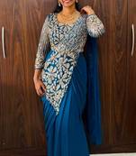 Blue embroidered pre-draped saree with designer blouse