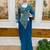 Blue embroidered pre-draped saree with designer blouse