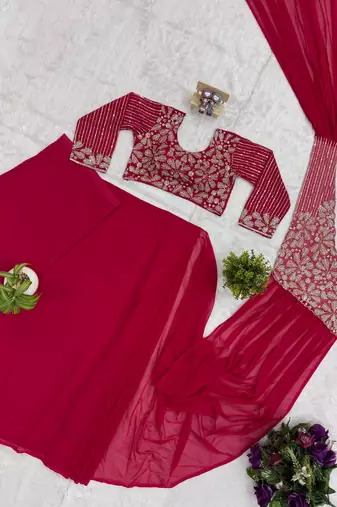 Hot pink embroidered pre-draped saree with designer blouse