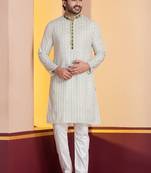 white silk blend kurta pyjama set for men with pinted work
