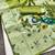 Parrot green art silk blend banarasi jacuard work pethani saree with unstitched blouse piece