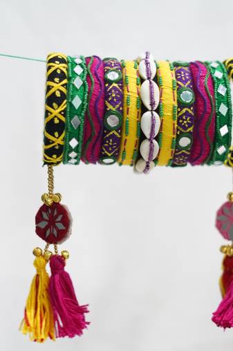  handcrafted multicolour kutchi boho bangle set with cowrie shells & tassels