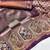 Wine beige art silk blend jacquard motif work saree with unstitched blouse piece