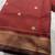 Maroon art silk blend banarasi jacquard motif work saree with unstitched blouse piece