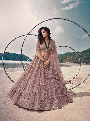 Mauve Net Semi Stitched Lehenga Choli with Embroidery & Jarkan Work 1