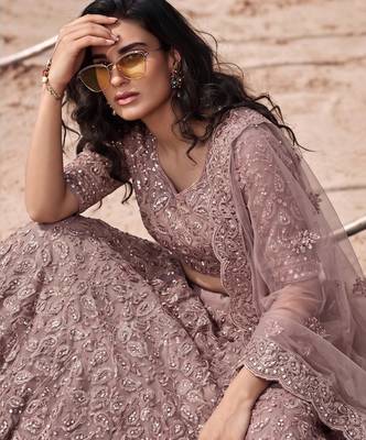 Mauve Net Semi Stitched Lehenga Choli with Embroidery & Jarkan Work 2