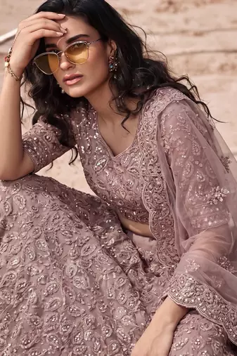 Mauve Net Semi Stitched Lehenga Choli with Embroidery & Jarkan Work