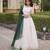 Dark Green & White Viscose Lehenga Choli with Zari Temple Weaving Work