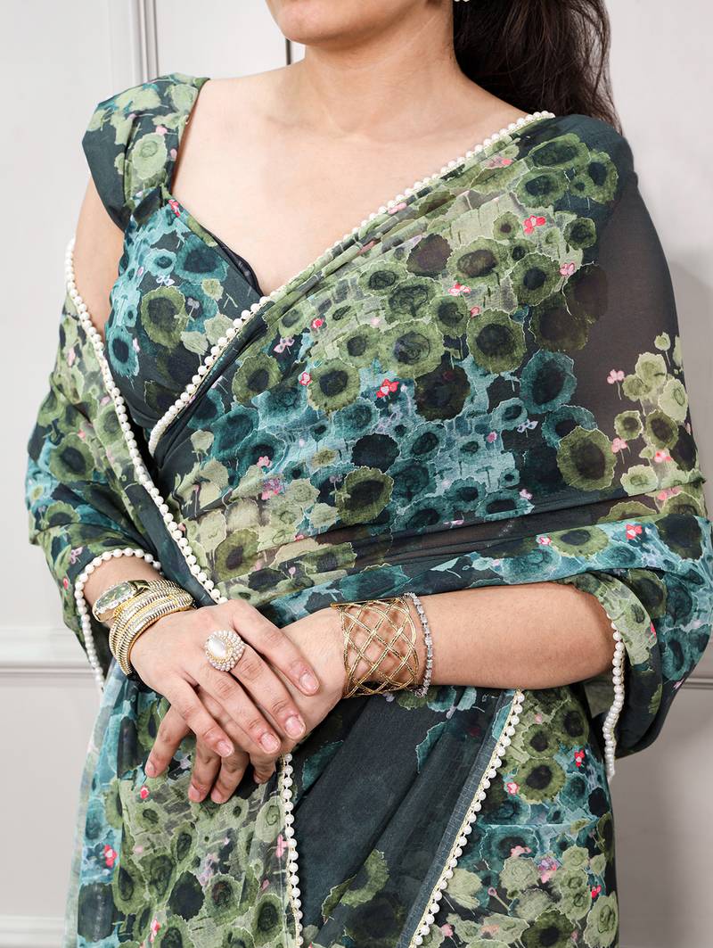 Floral print weightless marble saree with delicate pearl border