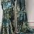 Floral print weightless marble saree with delicate pearl border