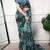 Floral print weightless marble saree with delicate pearl border