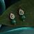 Emerald green american diamond teardrop earrings