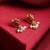 Ruby red stone pearl drop earrings